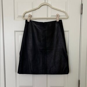 Black leather pencil skirt with side slits